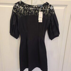 Little black dress. French Connection black, embroidered mini dress.